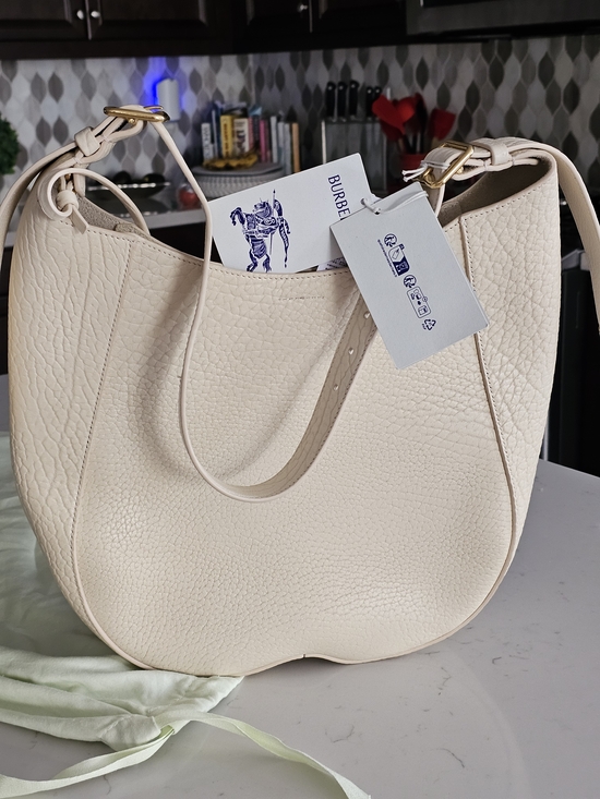 Burberry Handbags - Burberry Cream Pebbled Leather Shoulder Hobo with Gold Hardware